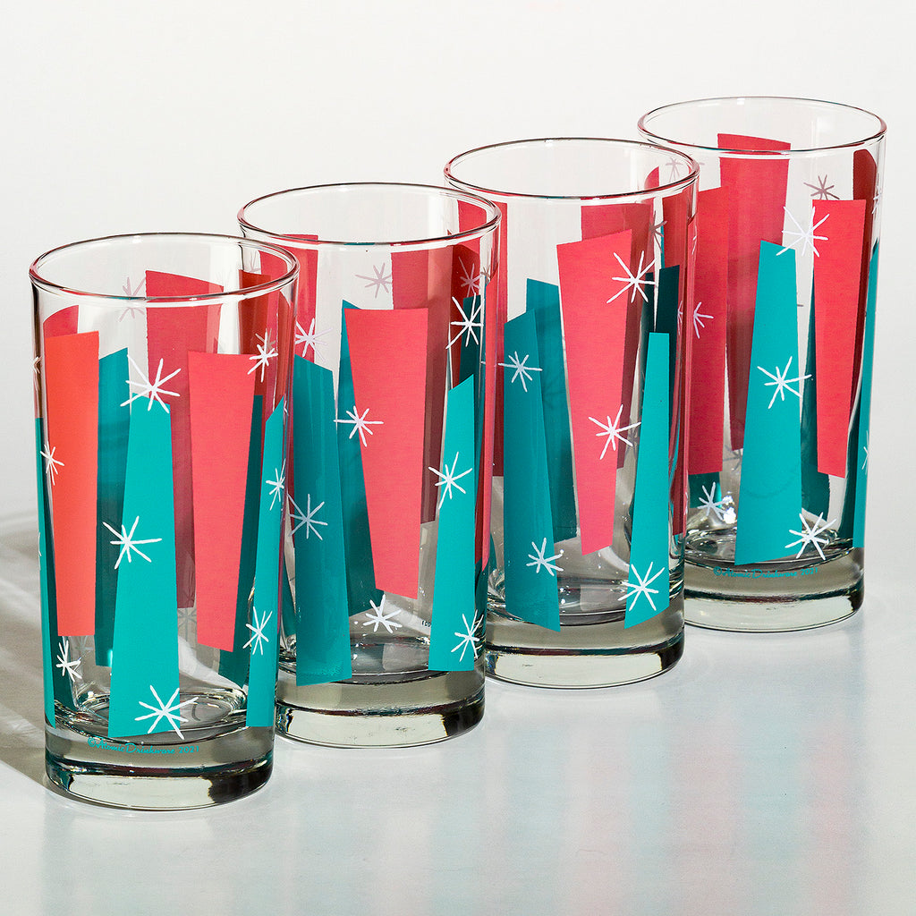 Mid century modern glass tumblers with colorful geometric vintage design on a white background