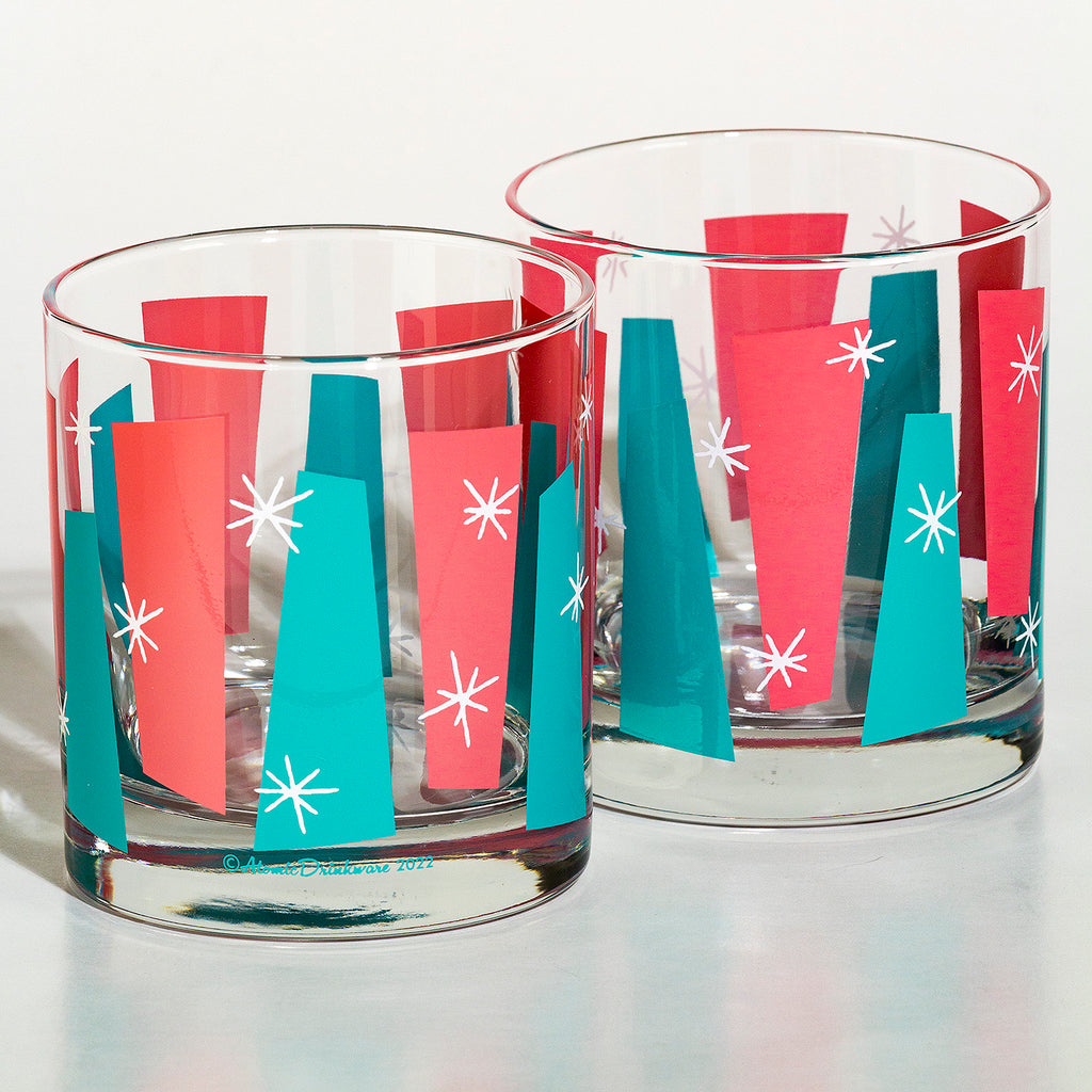 Mid-century modern rocks glass with retro atomic design in pink and aqua for cocktails and home bars