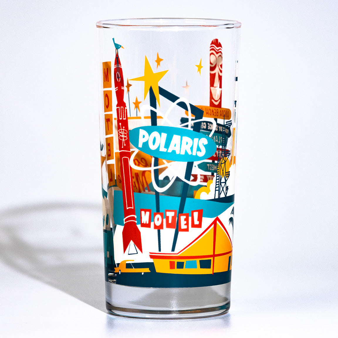 Glass with Polaris Motel design on a white background