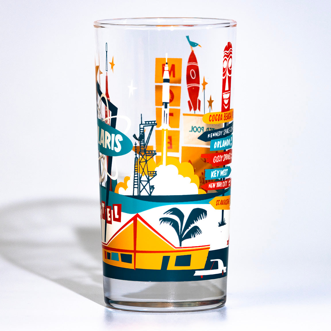 Glass tumbler with colorful cocoa beach space coast illustrations on a white background