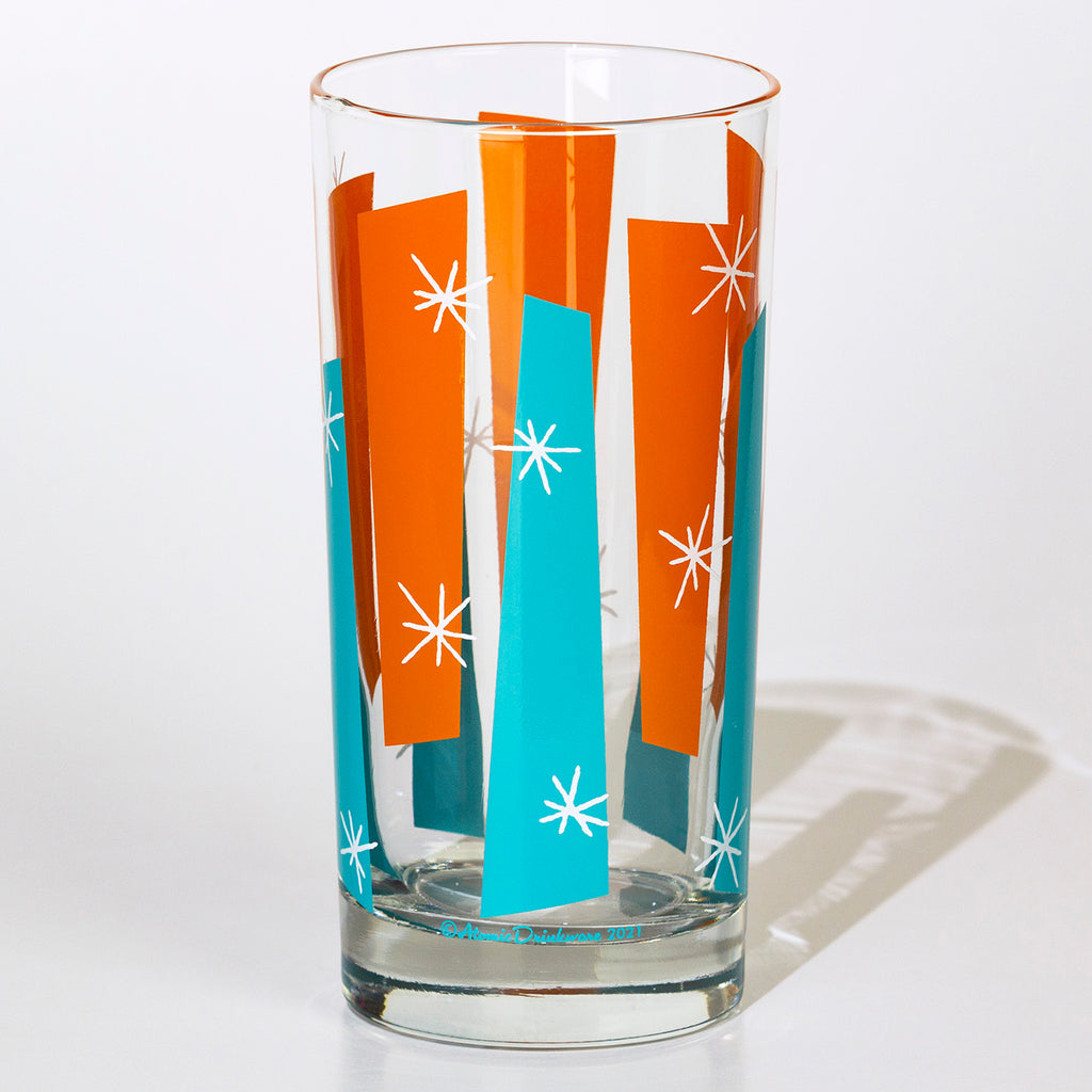 Clear glass with orange and blue retro design on a white background