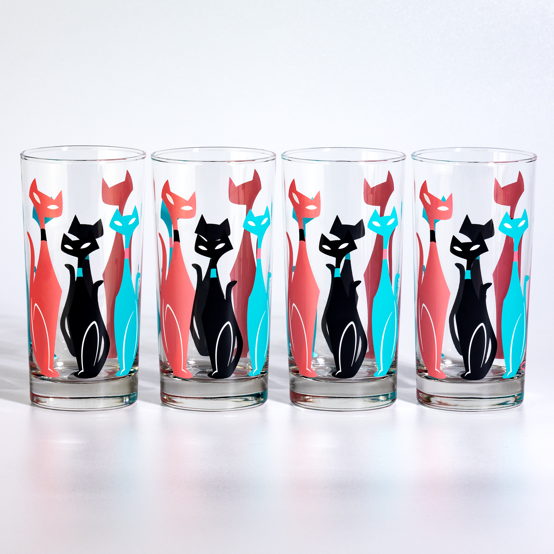 Retro cat rocks glass inspired by Sexton wall art, hand-printed mid-century cocktail glass.