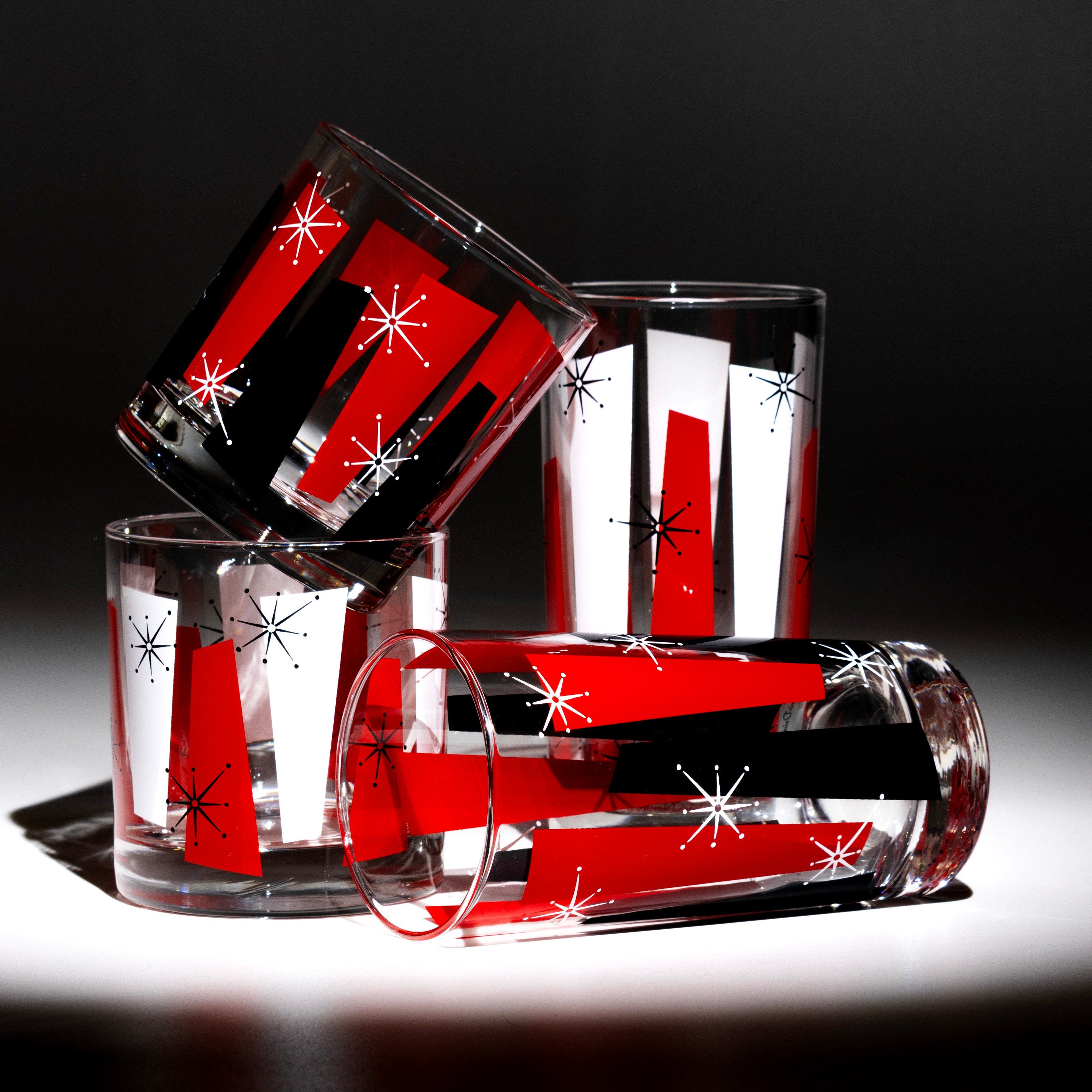 Red and black retro mid-century rocks glass for whiskey cocktails and home bars