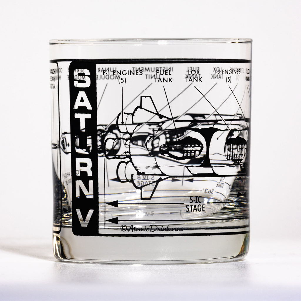 Clear glass with vintage graphic design of Saturn V rocket on a white background