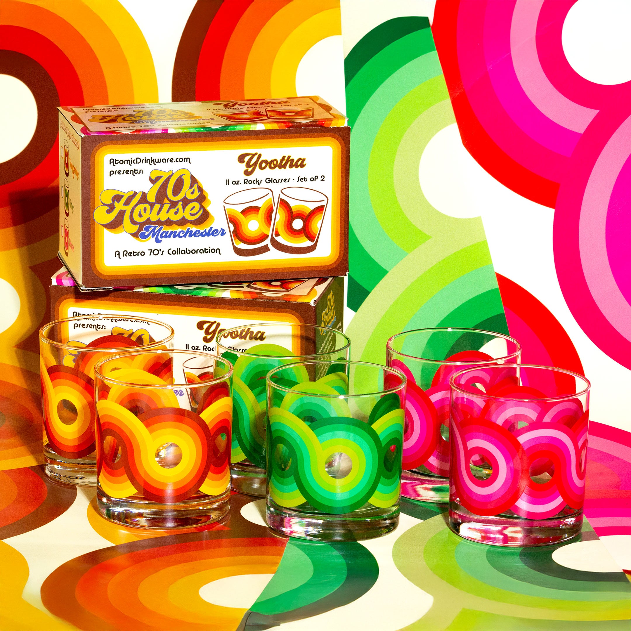 Premium retro glassware with '70s House Manchester' for home cocktails