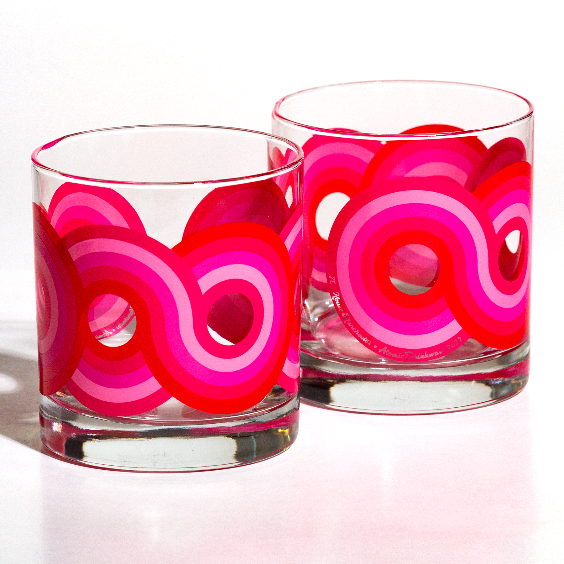 Retro 70s cocktail glass with swirling vintage design, groovy mid-century barware