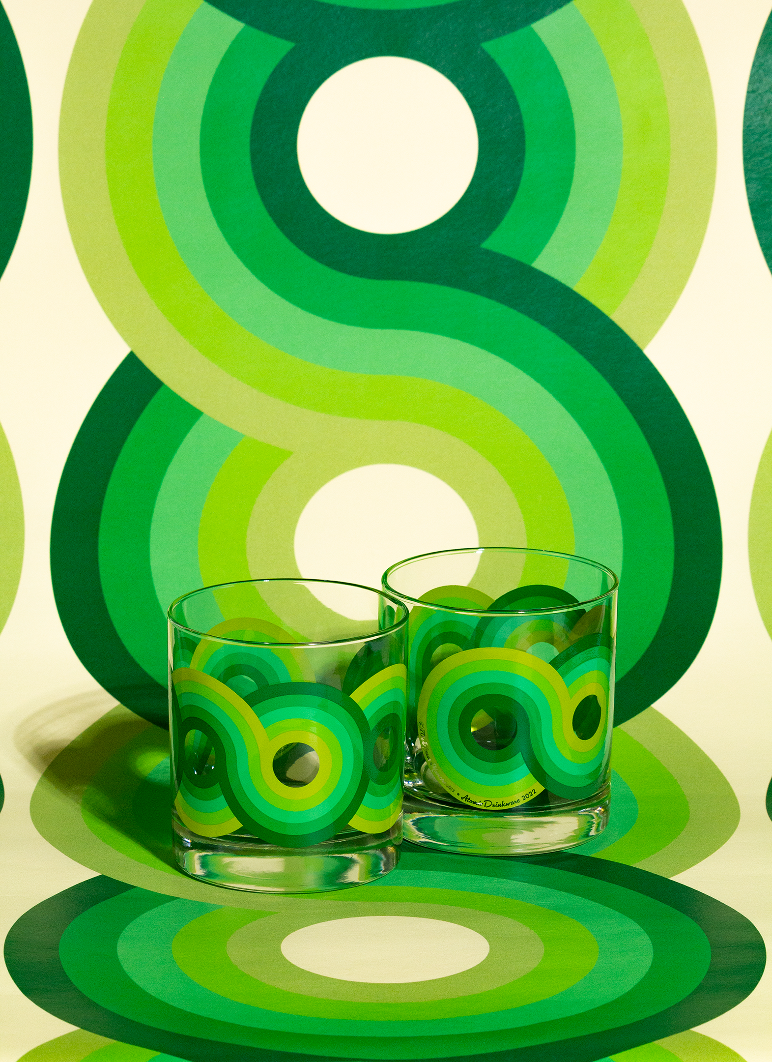 Groovy 70s drinkware with lime green swirl for home bar and retro entertaining