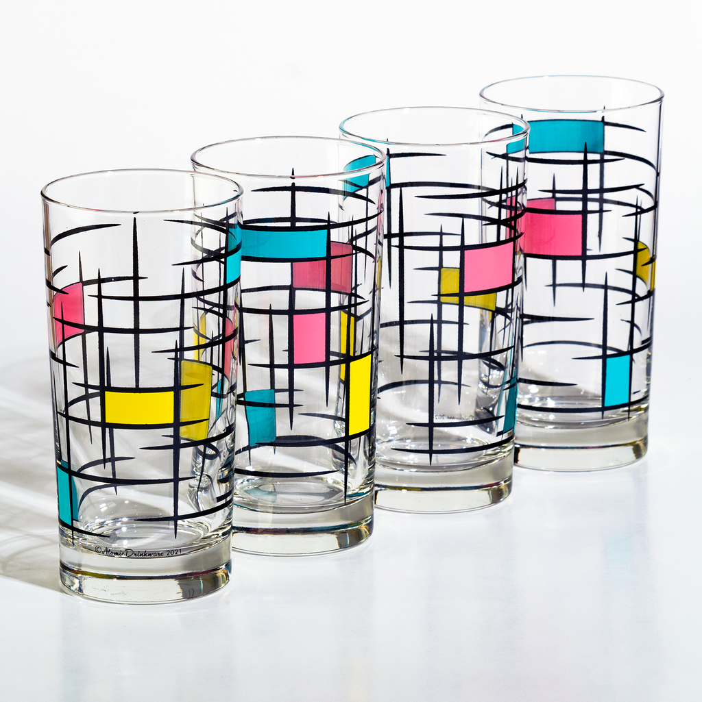 Set of retro atomic drinkware with colorful abstract brutalist mid century pattern on a white background