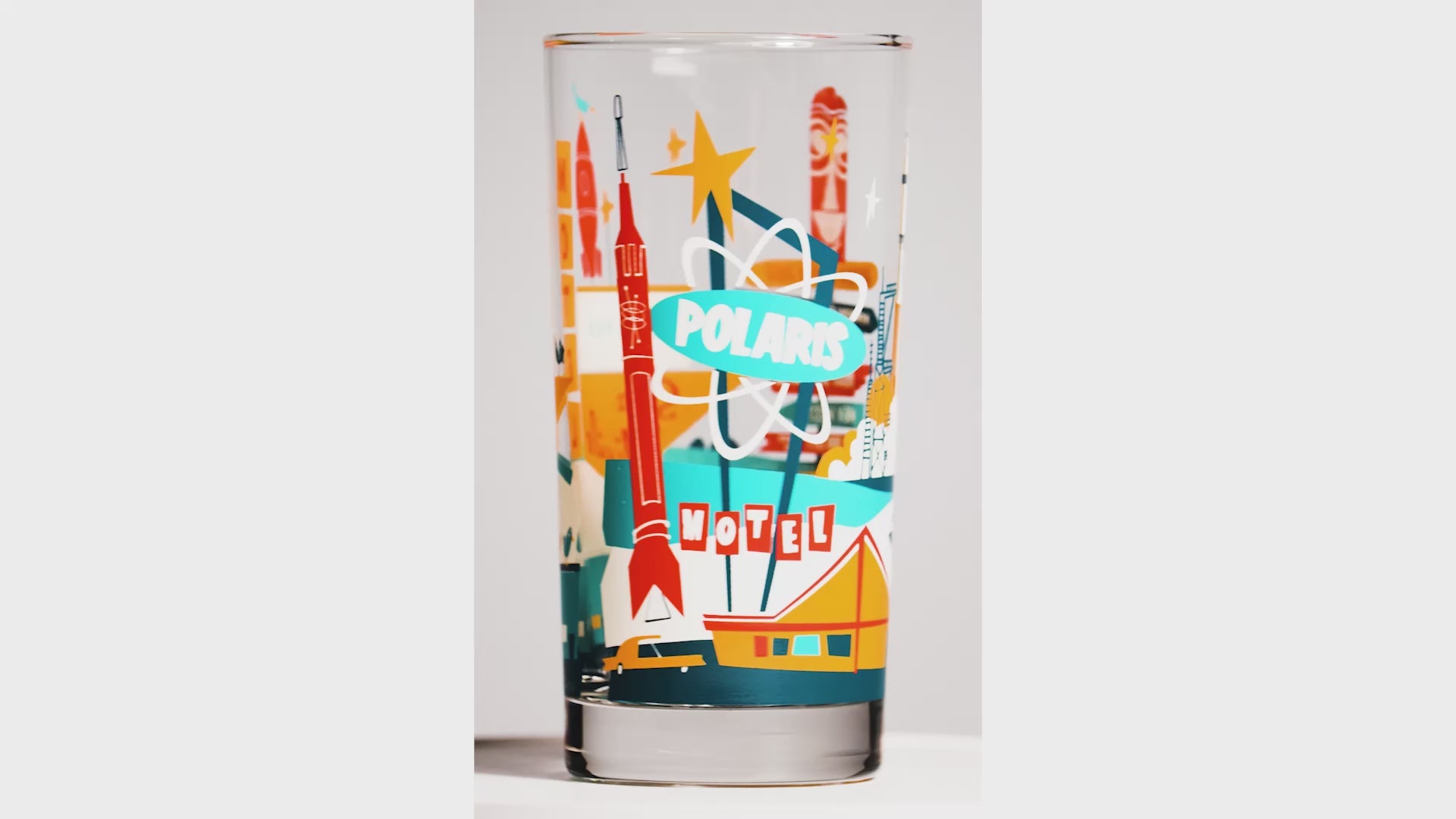 Spinning video of kitsch canveral glass on white background
